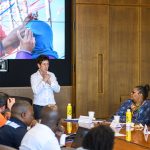 Nadine Fabbi presenting at the Humphrey Fellowship training at the UW Intellectual House, May 2024